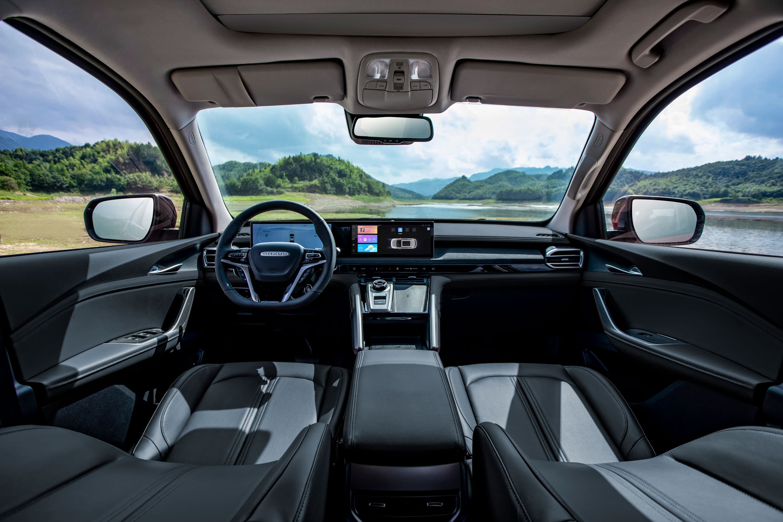Maxus T60 Max front black interior with view on lake